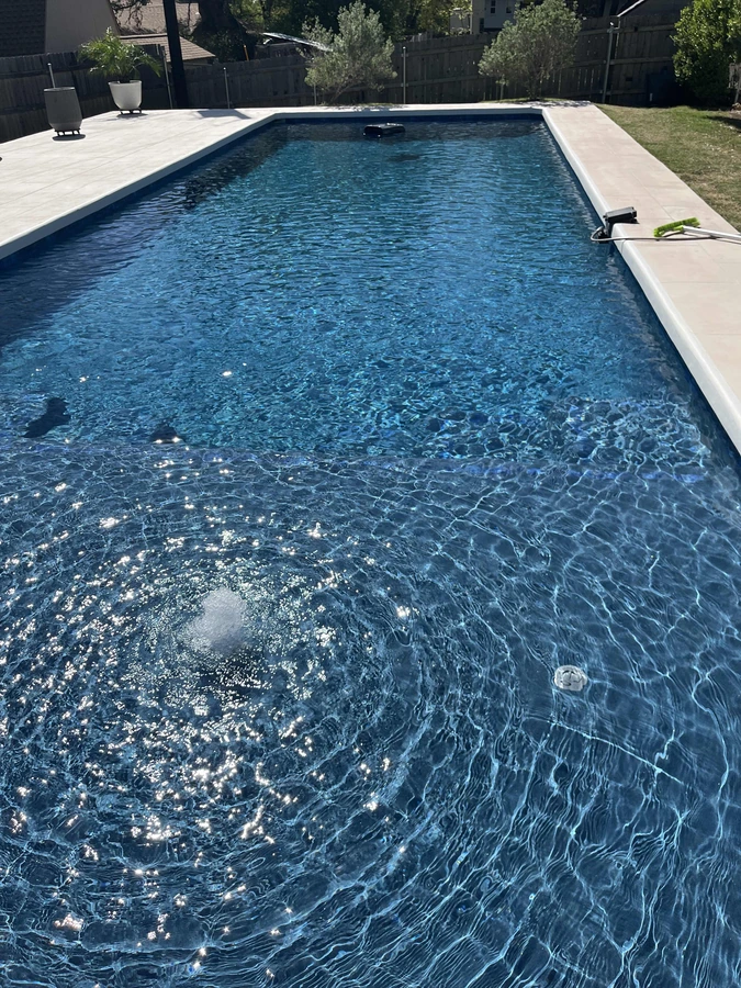 A neglected backyard pool before a Max Pools Austin service rescue